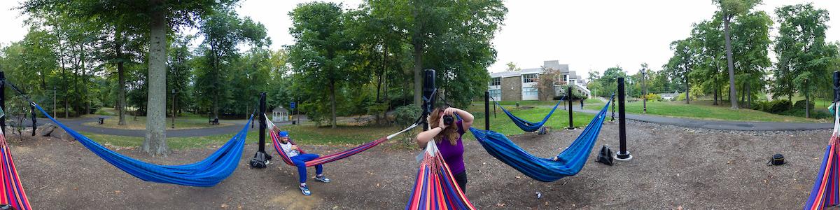 student snapping a photo with her camera